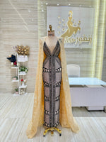 Load image into Gallery viewer, A captivating mauve, double-cloche dress with a flattering waistline, perfect for a special occasion.exclamation