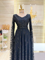 Load image into Gallery viewer, Black dress, hand-beaded with flow-to-the-floor sleeves