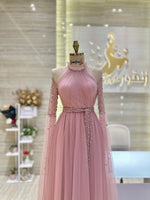 Load image into Gallery viewer, A soft peach, single-cloche dress with elegant sleeves, perfect for a family gathering.