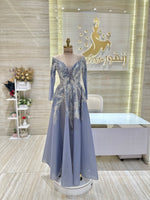 Load image into Gallery viewer, A captivating mauve, double-cloche dress with a flattering waistline, perfect for a special occasion.exclamation