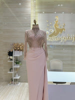 Load image into Gallery viewer, Nude-pink dress, crepe with a hand-made bodice, and long sleeves.