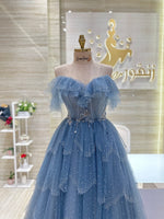 Load image into Gallery viewer, A soft peach, single-cloche dress with elegant sleeves, perfect for a family gathering.