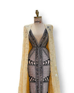Load image into Gallery viewer, A stunning gold, off-the-shoulder maxi dress with a flowing skirt, perfect for a summer evening party.