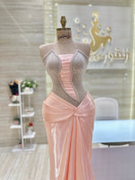Load image into Gallery viewer, A captivating mauve, double-cloche dress with a flattering waistline, perfect for a special occasion.exclamation