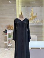 Load image into Gallery viewer, A unique, blue, single-cloche dress crafted with love, perfect for a family gathering.