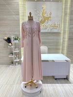 Load image into Gallery viewer, A classic black, sleeveless cocktail dress with a simple silhouette, ideal for a formal occasion.