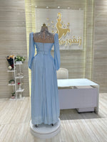 Load image into Gallery viewer, A stunning, knee-length dress with delicate lace details, ideal for celebrating an engagement