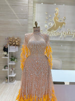 Load image into Gallery viewer, Fully-beaded orange dress. Feather skirt and sleeves.