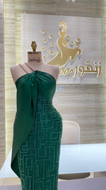 Load image into Gallery viewer, A stunning gold, off-the-shoulder maxi dress with a flowing skirt, perfect for a summer evening party.