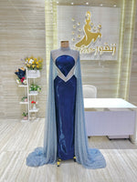 Load image into Gallery viewer, A flowing, sleeveless maxi dress in a soft, shimmering fabric, perfect for a summer evening