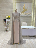 Load image into Gallery viewer, A stunning gold, off-the-shoulder maxi dress with a flowing skirt, perfect for a summer evening party.