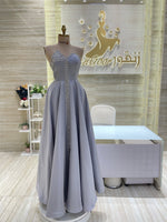 Load image into Gallery viewer, A unique, blue, single-cloche dress crafted with love, perfect for a family gathering.