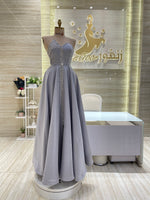 Load image into Gallery viewer, A vibrant fuchsia, sleeveless party dress with a playful skirt, ideal for a night out with friends.