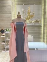 Load image into Gallery viewer, A vibrant red, double-cloche dress with a daring off-shoulder cut, ideal for a night out.