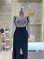 Load image into Gallery viewer, A soft peach, single-cloche dress with elegant sleeves, perfect for a family gathering.