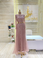 Load image into Gallery viewer, A classic black, sleeveless cocktail dress with a simple silhouette, ideal for a formal occasion.