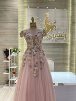 Load image into Gallery viewer, Haute Couture Elegance: A hand-crafted, floor-length gown in white, perfect for a bride on her wedding day.