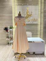 Load image into Gallery viewer, A soft pink, off-the-shoulder dress with delicate lace details, perfect for an engagement party.