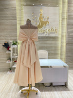 Load image into Gallery viewer, A vibrant red, double-cloche dress with a daring off-shoulder cut, ideal for a night out.