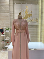 Load image into Gallery viewer, A shimmering, silver, sleeveless gown with a flowing skirt, perfect for a formal event.exclamation