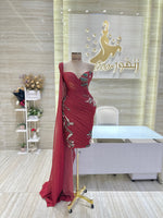 Load image into Gallery viewer, A flowing, sleeveless maxi dress in a soft, shimmering fabric, perfect for a summer evening