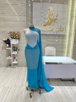 Load image into Gallery viewer, A soft peach, single-cloche dress with elegant sleeves, perfect for a family gathering.