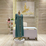 Load image into Gallery viewer, A comfortable and stylish knee-length dress with sleeves, perfect for a family gathering