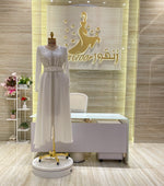 Load image into Gallery viewer, A stunning, knee-length dress with delicate lace details, ideal for celebrating an engagement