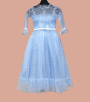 A classic black, sleeveless cocktail dress with a simple silhouette, ideal for a formal occasion.