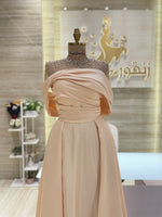 Load image into Gallery viewer, A captivating mauve, double-cloche dress with a flattering waistline, perfect for a special occasion.exclamation