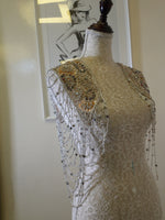 Load image into Gallery viewer, A comfortable and stylish knee-length dress with sleeves, perfect for a family gathering