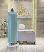 Load image into Gallery viewer, A flowing, sleeveless maxi dress in a soft, shimmering fabric, perfect for a summer evening