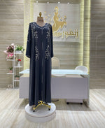 Load image into Gallery viewer, A vintage-inspired double-cloche dress with a flattering silhouette, ideal for a special occasion