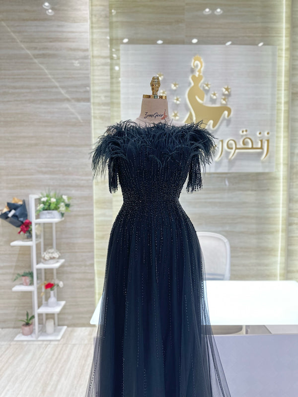 A captivating mauve, double-cloche dress with a flattering waistline, perfect for a special occasion.exclamation