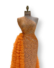 A stunning, knee-length dress with delicate lace details, ideal for celebrating an engagement