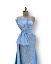 A vintage-inspired double-cloche dress with a flattering silhouette, ideal for a special occasion