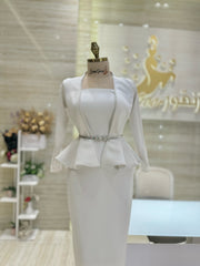 A vintage-inspired double-cloche dress with a flattering silhouette, ideal for a special occasion