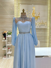 A comfortable and stylish knee-length dress with sleeves, perfect for a family gathering