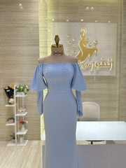 Custom-made party dress designed to flatter your figure.