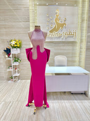 A soft peach, single-cloche dress with elegant sleeves, perfect for a family gathering.