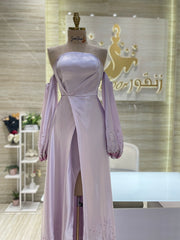 A comfortable and stylish knee-length dress with sleeves, perfect for a family gathering