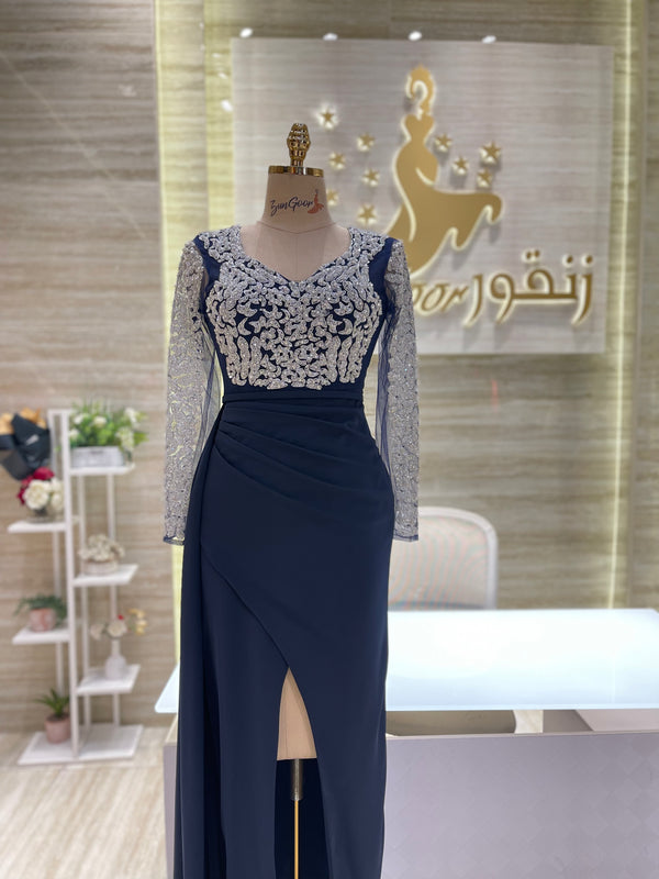 A stunning, knee-length dress with delicate lace details, ideal for celebrating an engagement