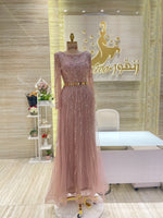 Load image into Gallery viewer, A soft peach, single-cloche dress with elegant sleeves, perfect for a family gathering.
